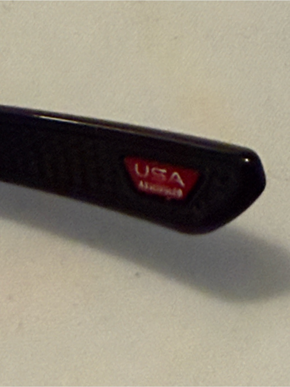 Oakley Black Sunglass Temple with Red USA Emblem